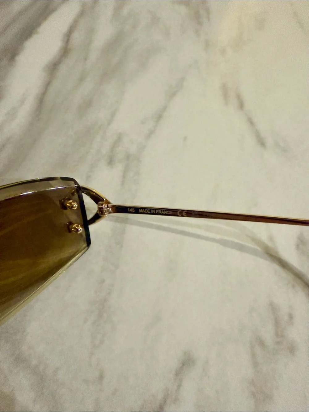 Cartier Rimless Sunglasses in Gold with Brown Tinted Lenses